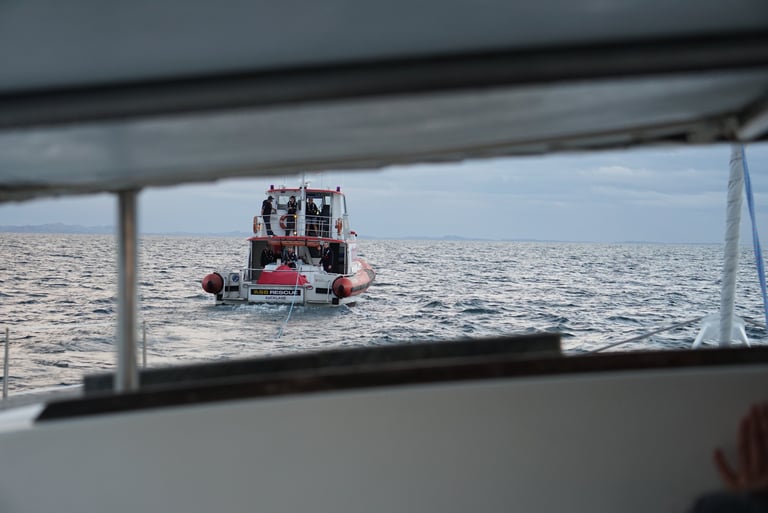 Coast Guard giving us a tow into port