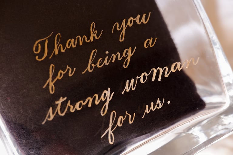 Hand engraved message on a glass by NYC engraver Handwritten by Belle.
