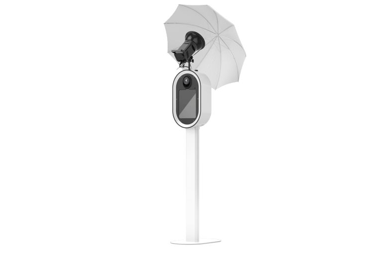 a white umbrella on a photobooth