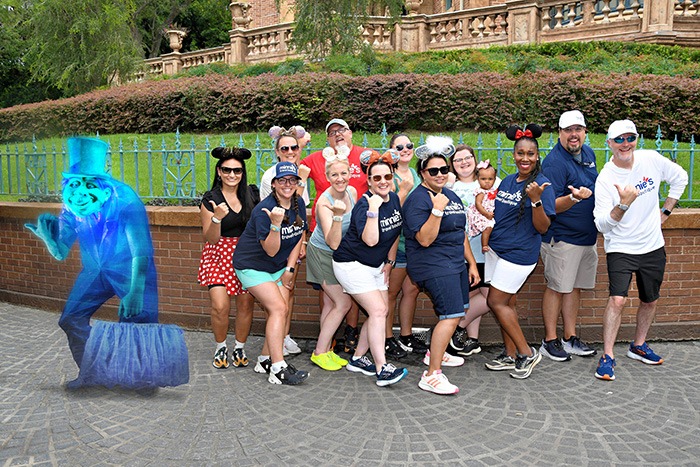 Minnie's Travel Boutique pictured with a hitchhiking ghost in front of the Haunted Mansion at Disney's Magic Kingdom® Park.