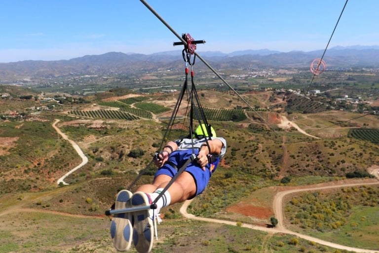 ZIPLINE RIDE overlooking mountains
