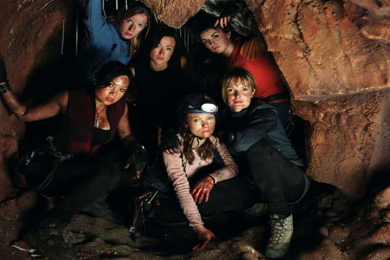 a group of people standing in a cave