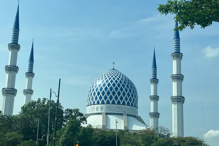 View of dome and minarets of the Blue Mosque in Malaysia 
