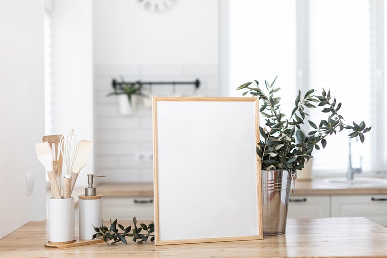 a picture frame with a picture frame and a plant in a potted potted