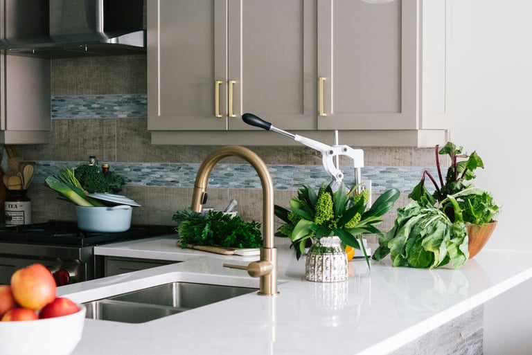 a kitchen with a bowl of fruit and vegetables