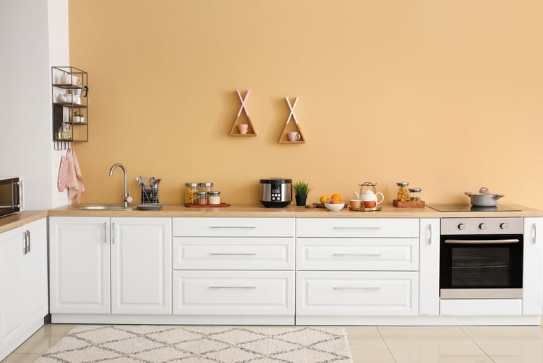 a kitchen with a stove top oven and a microwave