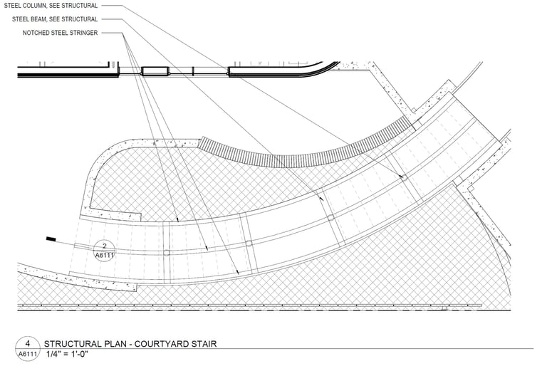 An architectural drawing of a curving stair