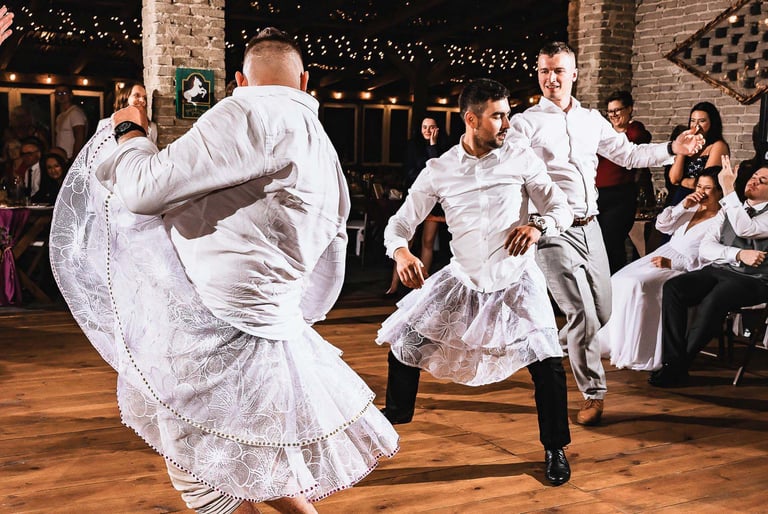 a couple of men and women dancing in a dance floor