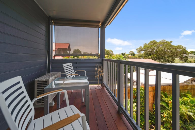 A peaceful balcony space perfect for morning coffee or quiet evening relaxation.
