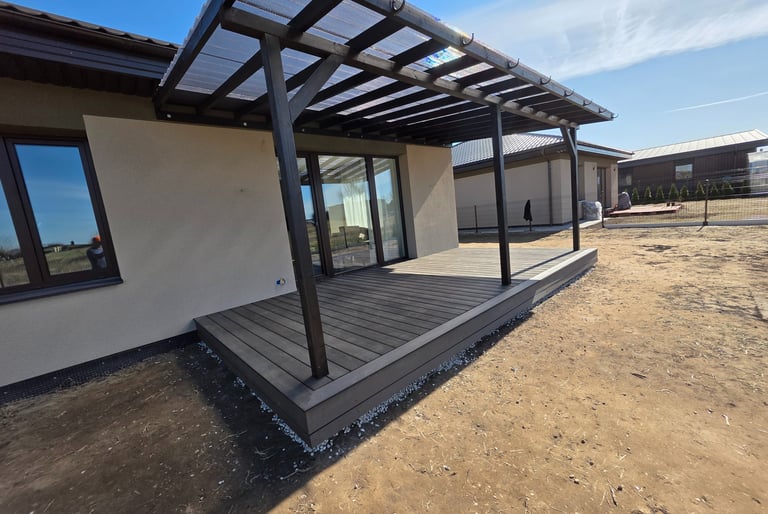 a house with a deck and a covered patio