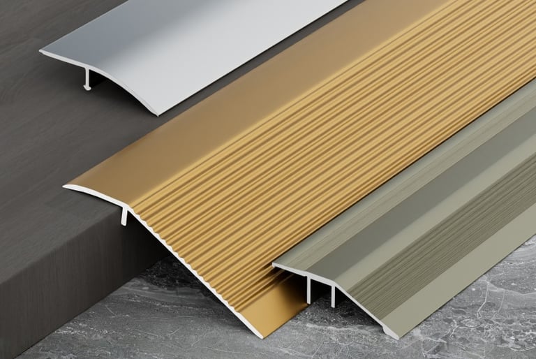 Silver gold and gray metal floor transition strips for connecting different flooring surfaces, decorative and functional floo