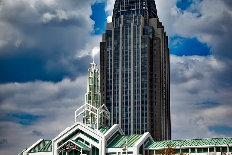 a large building with a clock tower in the background