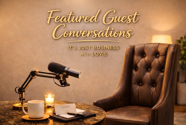 Professional podcast setup with a microphone, coffee mug, and leather chair for Featured Guest Conversations.