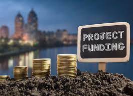 a sign that says protect funding for the project