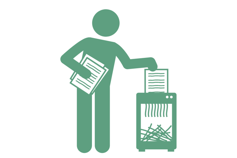 a person standing in front of a shredder