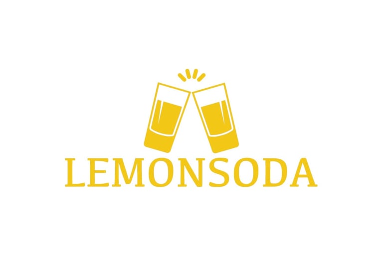 a pair of glasses with a drink and a lemonade