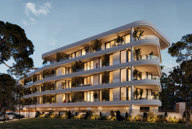 Evening view of Lev Limassol contemporary building with warm exterior lighting