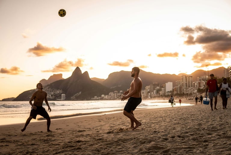a group of people playing soccer on a beach