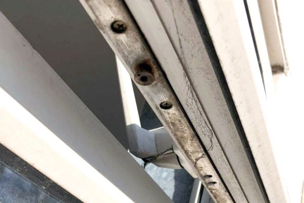 picture of a broken upvc window lock
