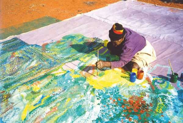 Emily Kam Kngwarray painting Earth's Creation I in the Utopia region, Central Australia, 1994 Photo