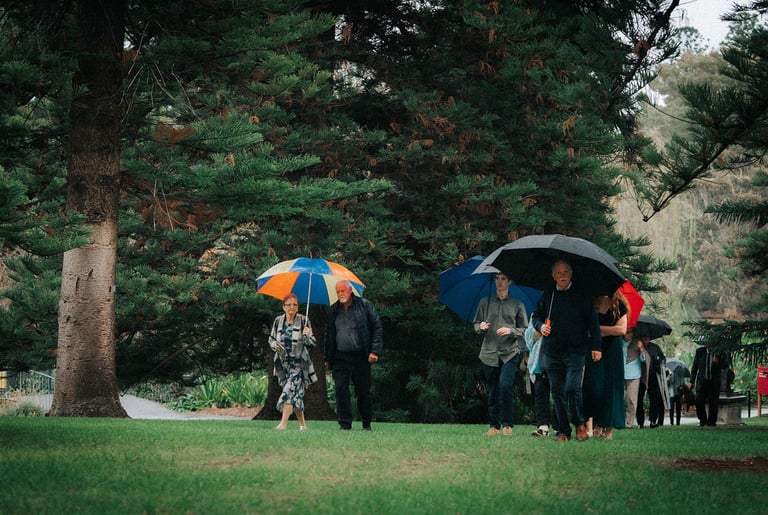 Rain arriving during an outdoor wedding ceremony in Adelaide
