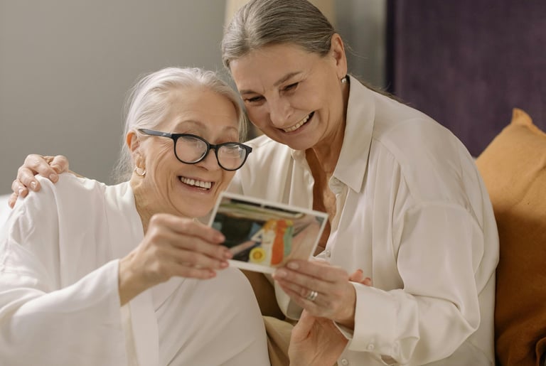 Two women sharing a photograph