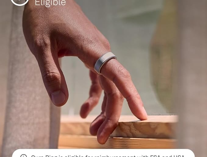 a person's finger on a wooden table