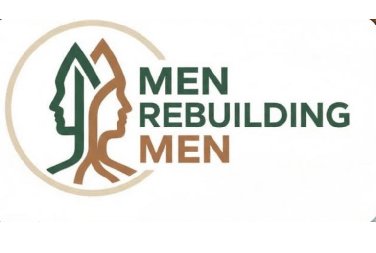 a man in a suit and tie with a beard and mustache