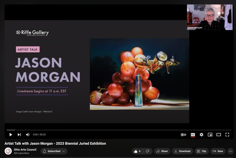 a video of an artist speaking about a painting of grapes and a golden airplane