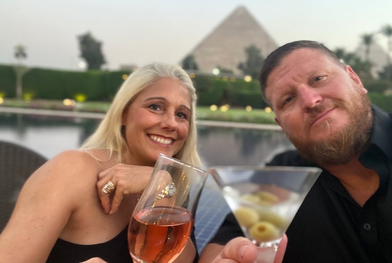 a man and woman are sitting at a table