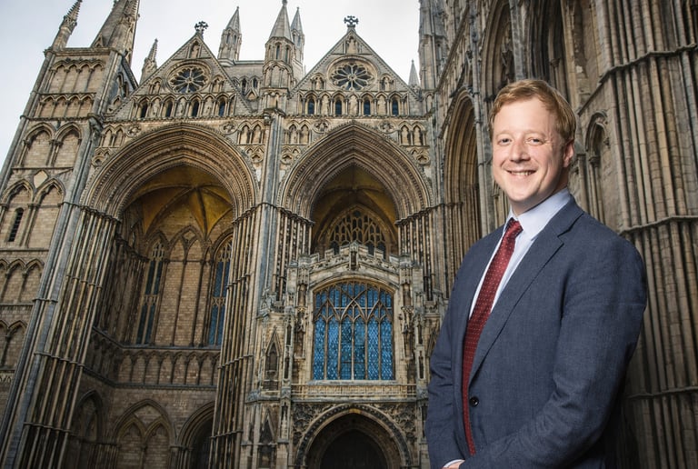 Paul Bristow, Mayor of Cambs and Peterborough, standing in from of Peterborough Cathedral.