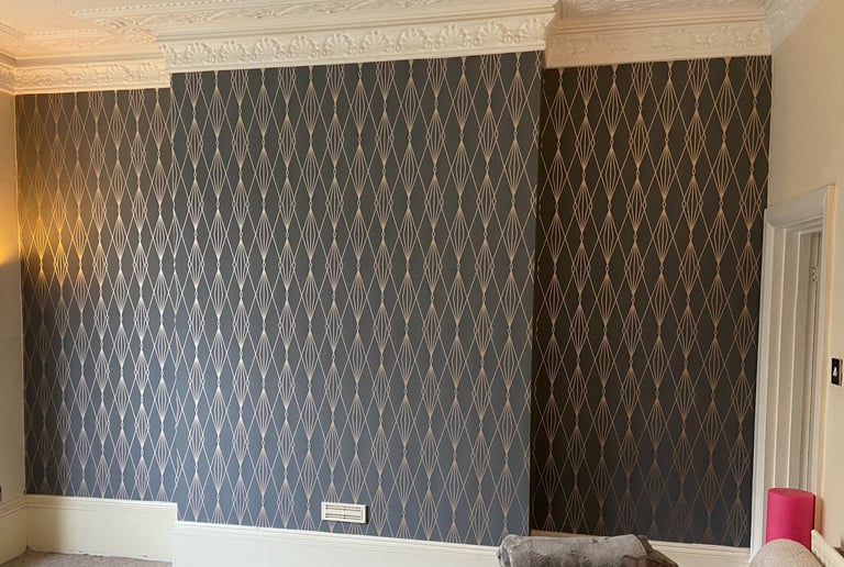 Elegant room with charcoal and gold geometric art decor wallpaper in Hove.
