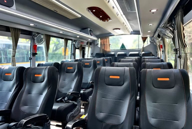 27 seater luxury bus interior for short group tours in Delhi NCR