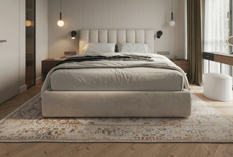 Elegant bedroom with upholstered bed, modern lighting, and patterned rug