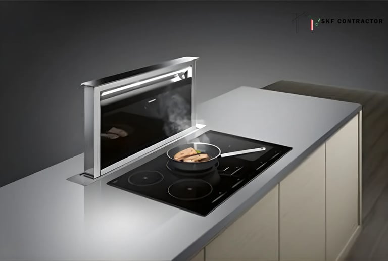 Modern induction cooktop with a sleek pop-up downdraft extractor fan venting steam from a frying pan.