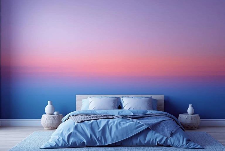 Modern bedroom with a blue bed and a sunset-inspired ombre wall mural in purple, pink, and blue.