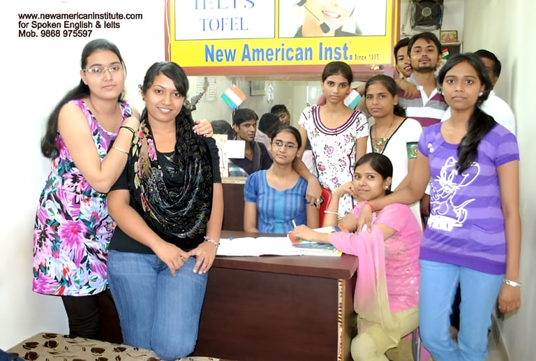 a group of people standing around a desk
