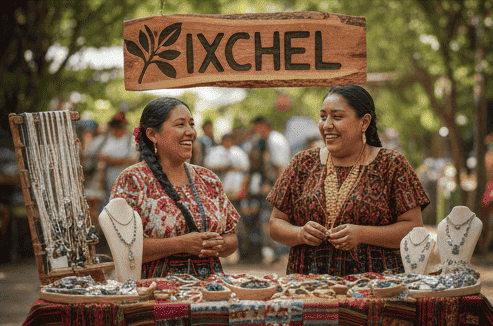 Mujeres sonrientes vendiendo joyas artesanales hechas a mano en un puesto del mercado al aire libre