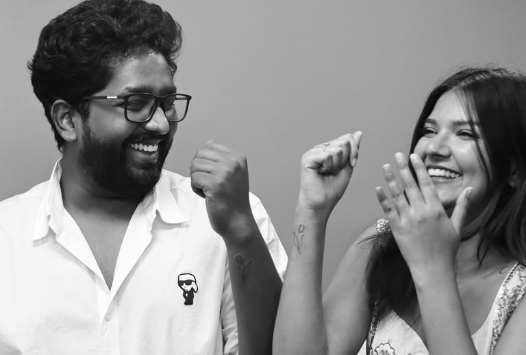 Matching heart tattoos for a couple on wrists at Dudo’s Tattoos in Hyderabad