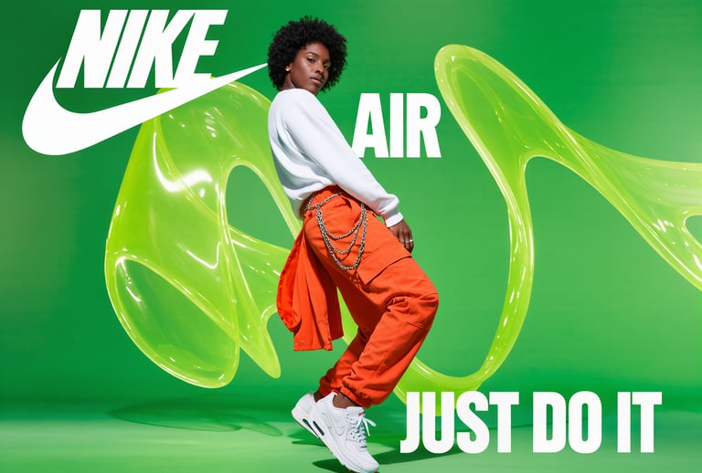 a woman in a white shirt and orange pants with a green background