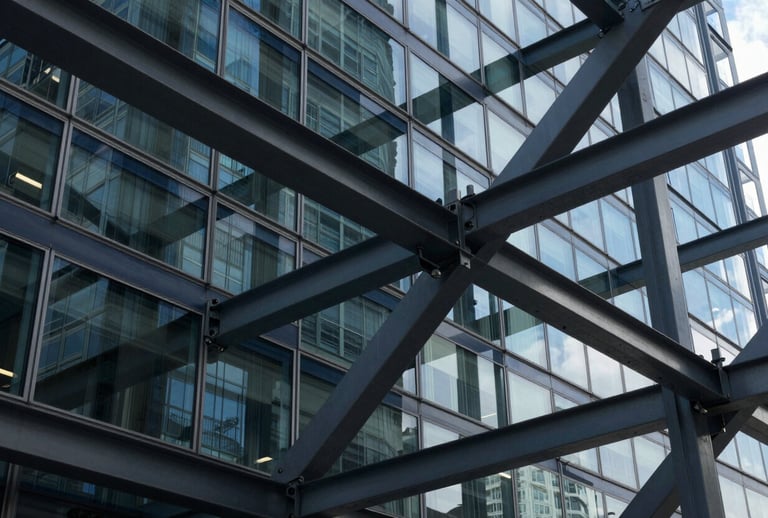 Abstract photography of a complex network of glass and steel beams reflecting deep navy and charcoal grey, symbolizing robust systems integration in a modern North American / Global corporate environment.