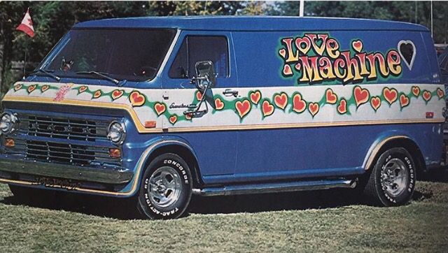 a van with Love Machine message