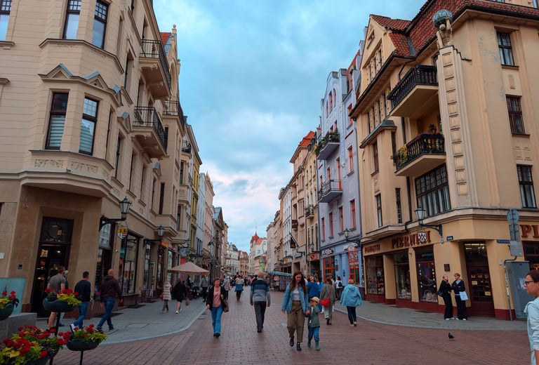 Walking through charming cobblestone streets in Toruń Poland