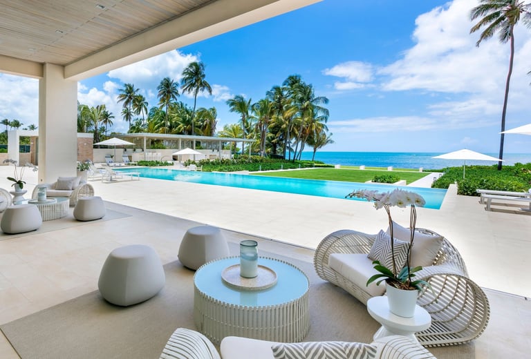 a large outdoor patio with a pool in puerto rico