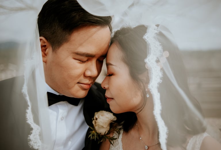 Snuggling couple Rocky Point Park Elopement Photoshoot