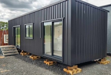 Tiny or transportable home with dark cladding