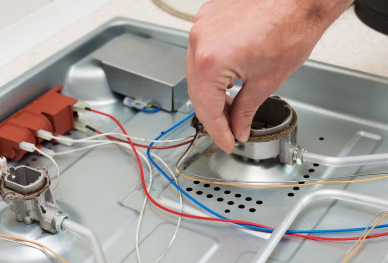 a person is holding a small device in their hand