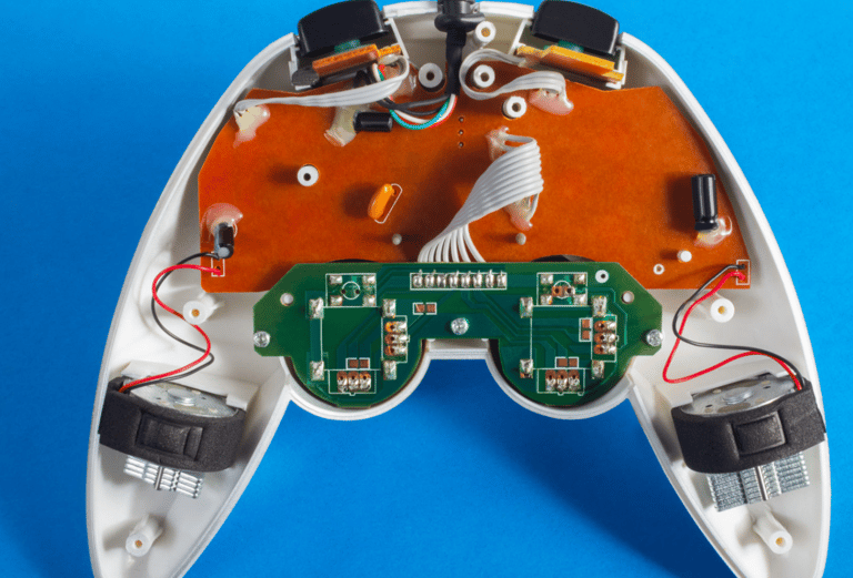 a white and green electronic device with a bird on it