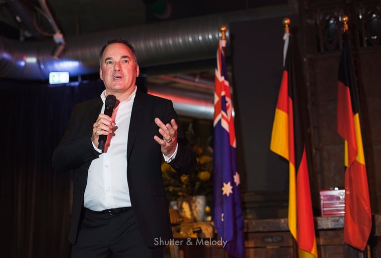 Graeme Mason speaking to guests at a Berlinale event.