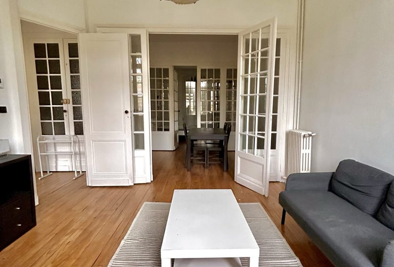 a living room with a couch and a coffee table